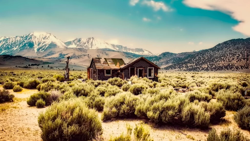 Abandoned House Desert Mountains Bushes Snow Peaks