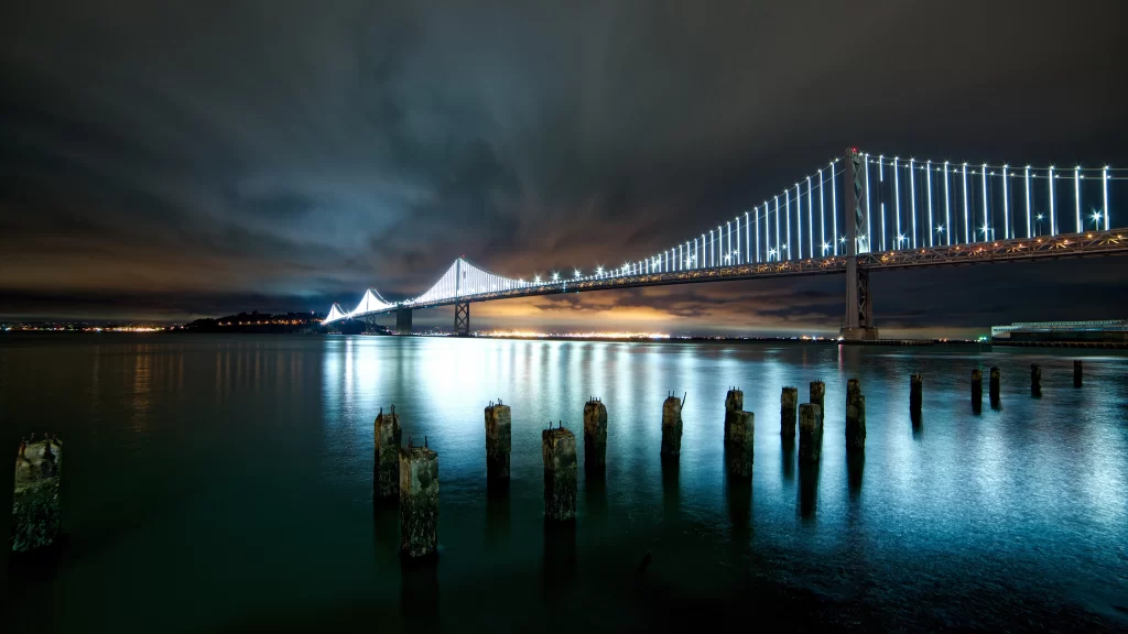 Bridge Night Lights Water Reflection Clouds