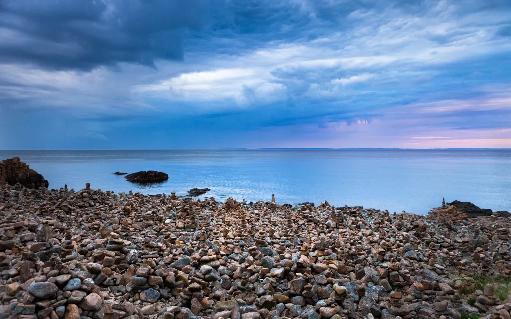 Cloudy Sky Ocean Rocks Shoreline Calm
