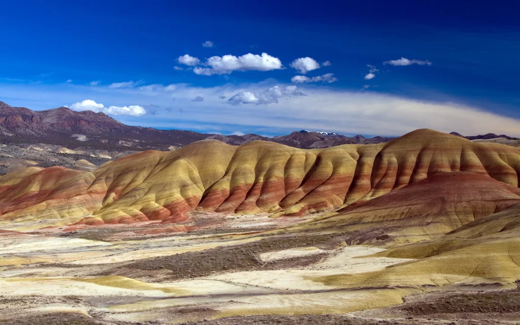 Desert Hills Colorful Layers Blue Sky Clouds