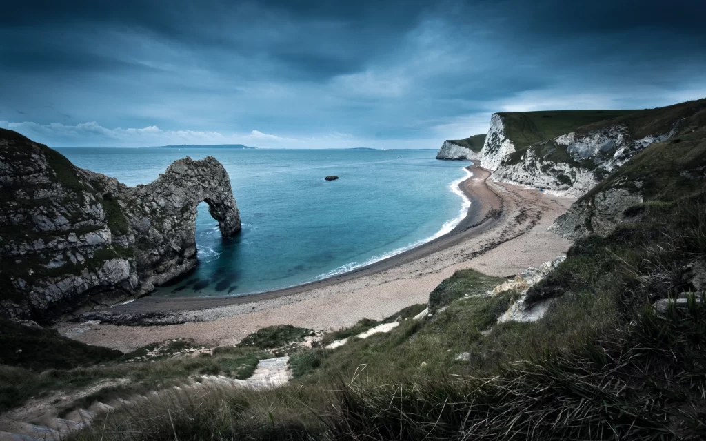 Beach Ocean Cliffs Rock Arch Cloudy Sky