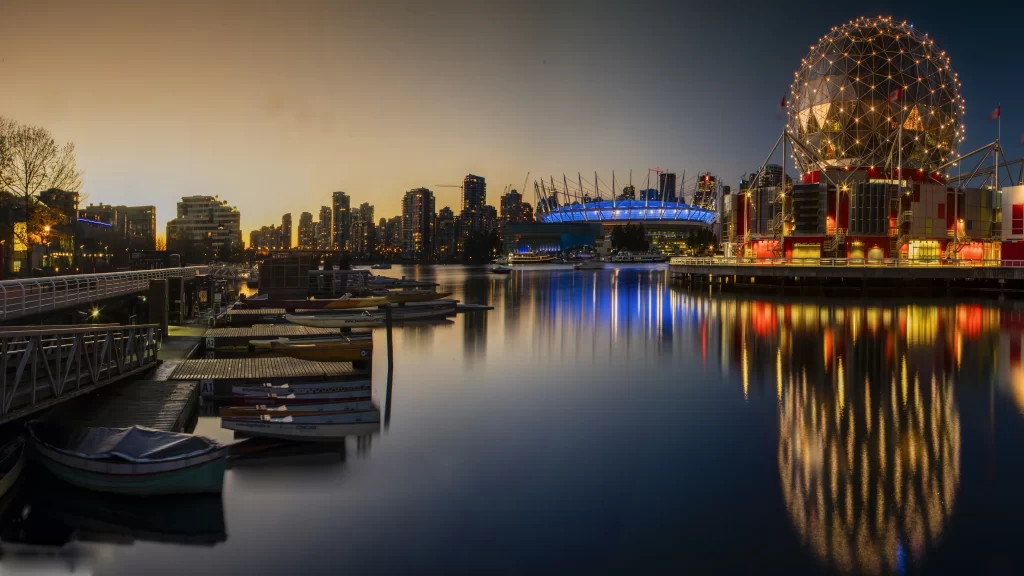 Boats water cityscape sunset reflections lights