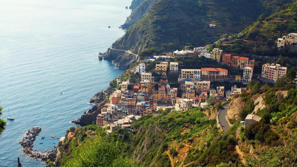 Coastal Village Colorful Houses Cliffside Sea Greenery
