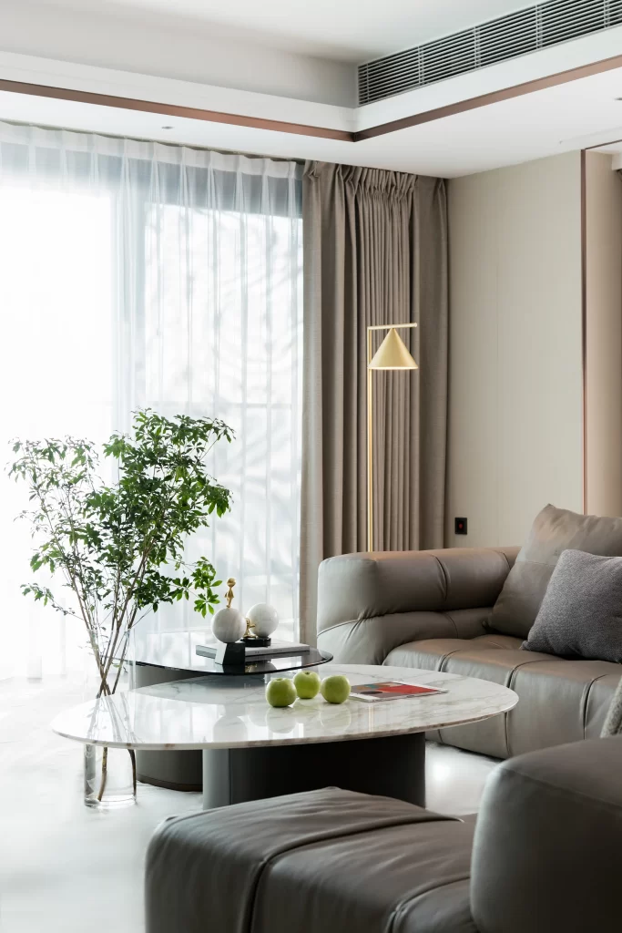 Contemporary Living Room Grey Sofa Marble Coffee Table Neutral Tones