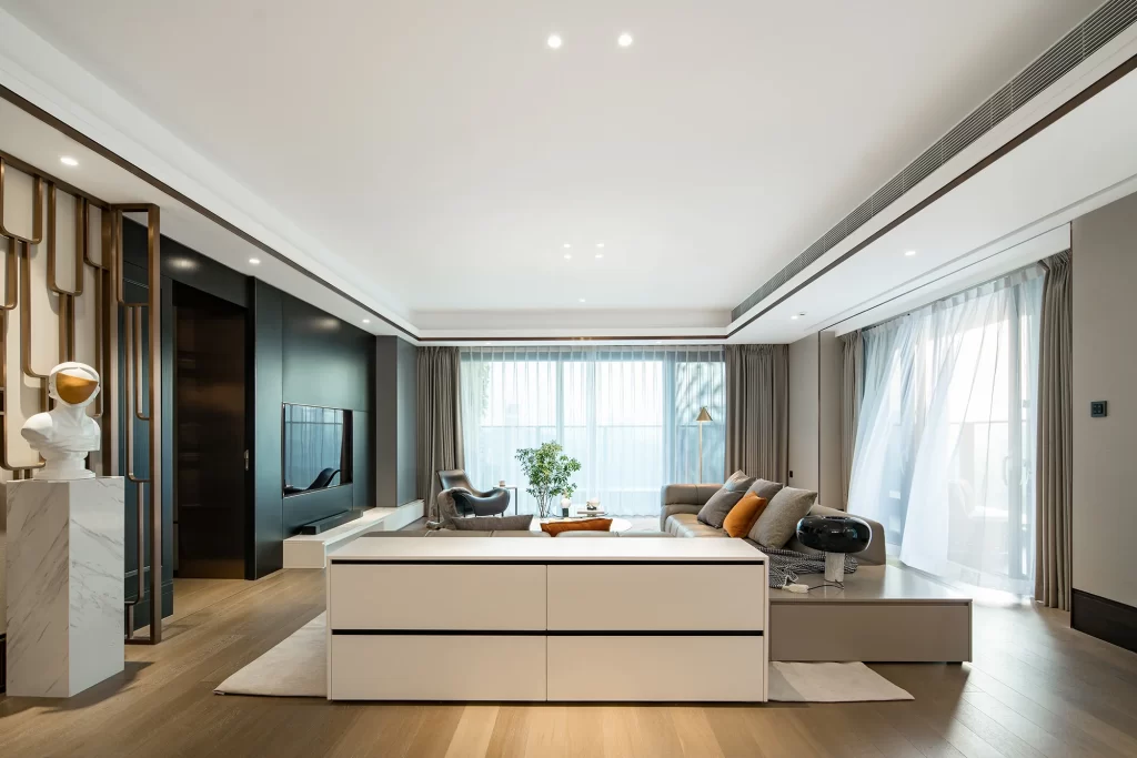 Contemporary Living Room White Sofa Black Coffee Table Neutral Tones