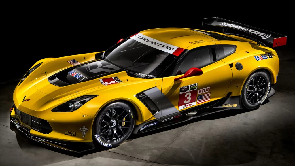 Corvette racing car yellow aerodynamic sponsor logos racing number