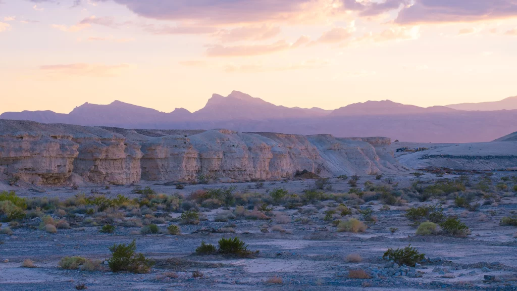 Desert sunset mountains sky vegetation landscape