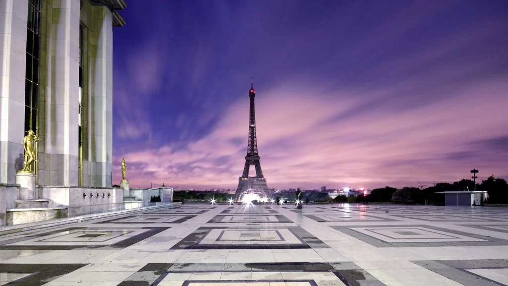 Eiffel Tower Paris twilight architecture sky clouds plaza statues