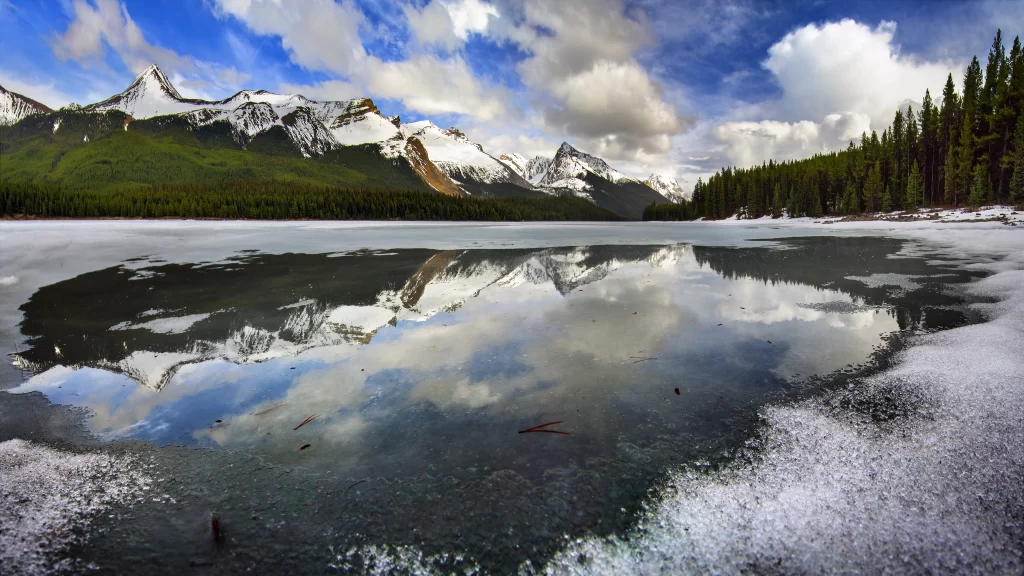 Frozen Lake Snow-capped Mountains Clear Sky Reflection Forest Tranquil