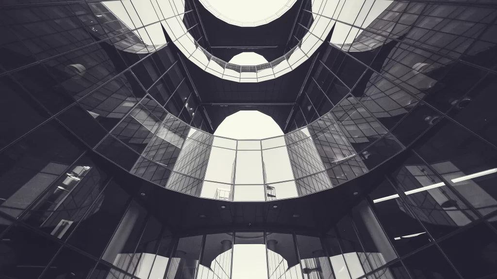 Modern architecture glass facade geometric shapes interior design reflective sur