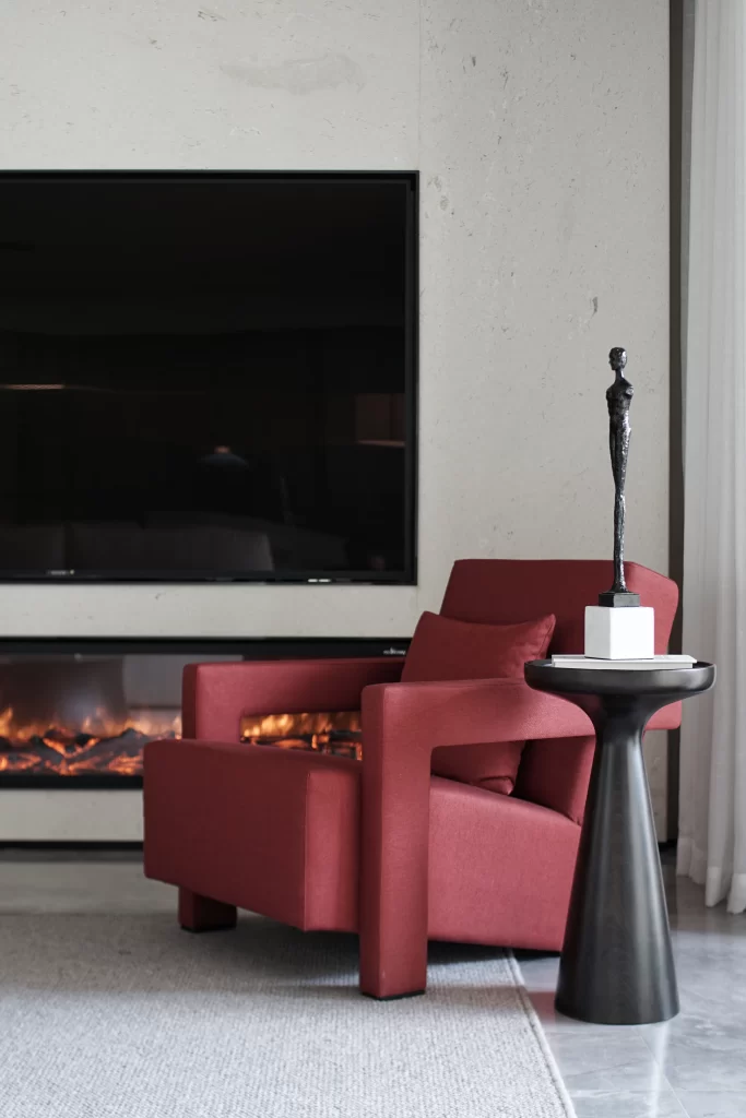 Modern living room red armchair black table
