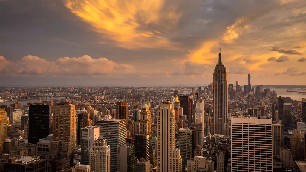 New York City skyline sunset skyscrapers clouds urban