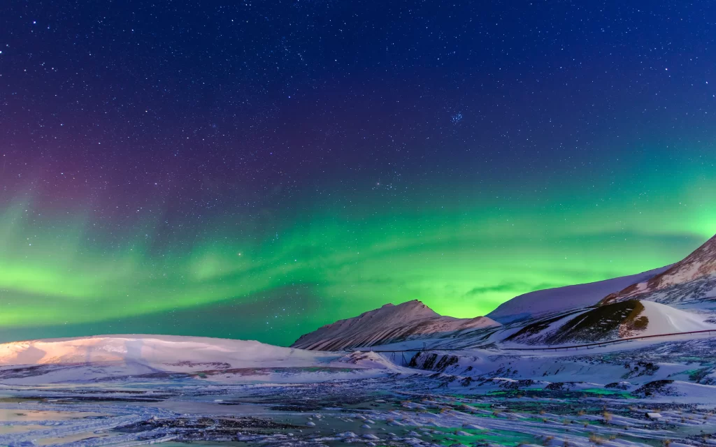 Northern Lights snow mountains stars night landscape