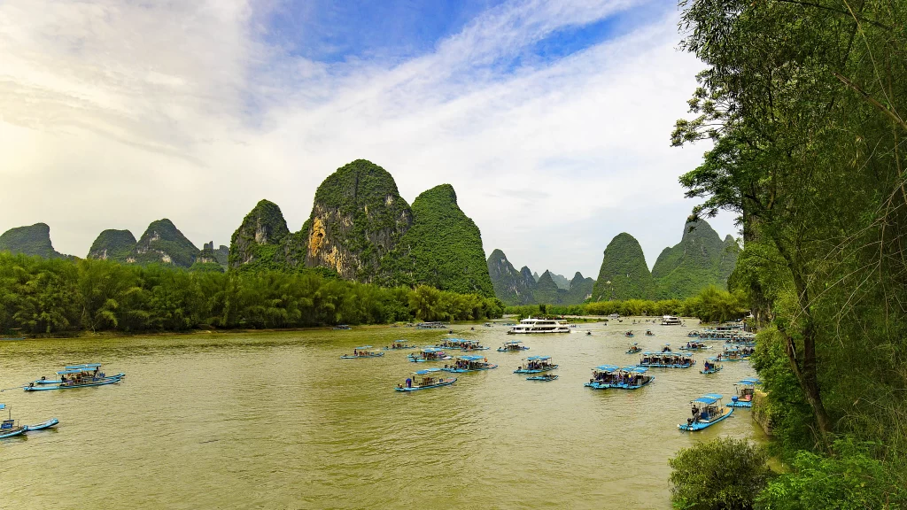 River Boats Mountains Trees Sky