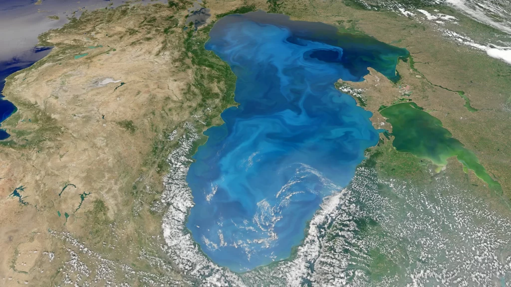 Satellite view Caspian Sea geographical features land water cloud formations