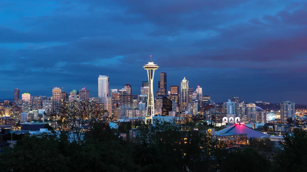 Seattle skyline Space Needle cityscape twilight urban architecture lights clouds