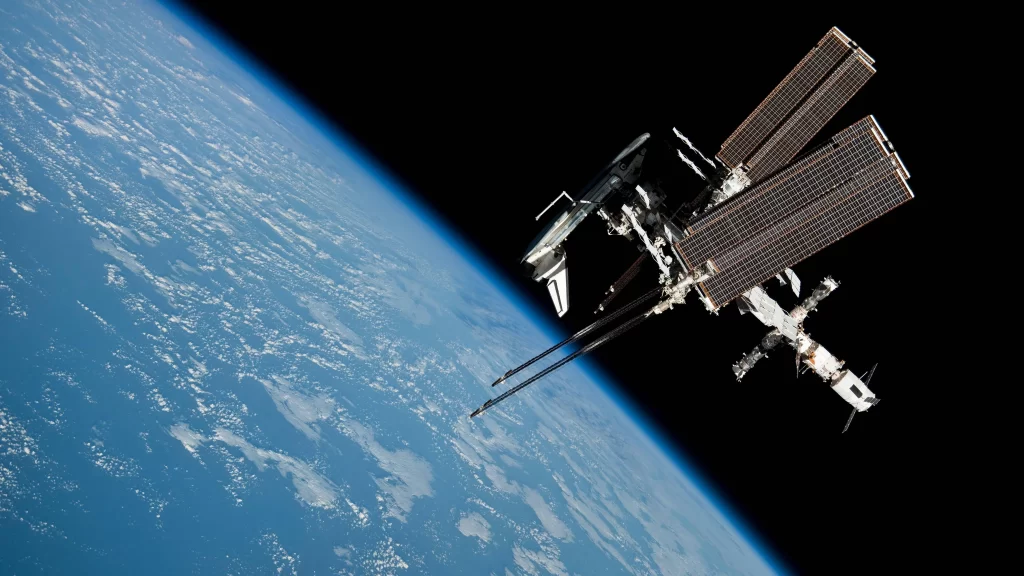 Space Earth satellite orbit solar panels cosmos exploration