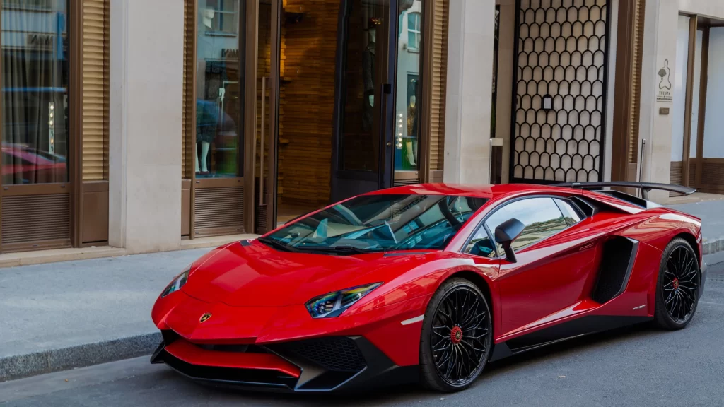 Sports car luxury red urban storefront street