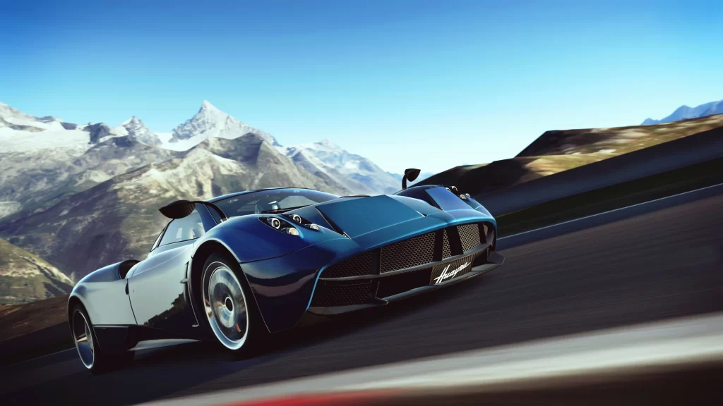 Sports car mountain road speed luxury scenic
