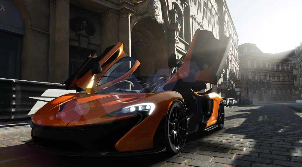 Sports car orange city street sunlight luxury modern