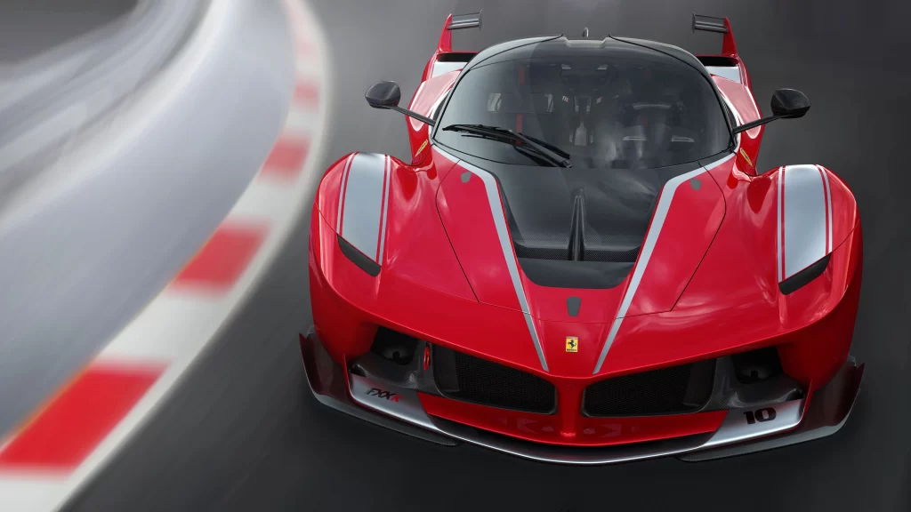 Sports car red racing Ferrari speed track