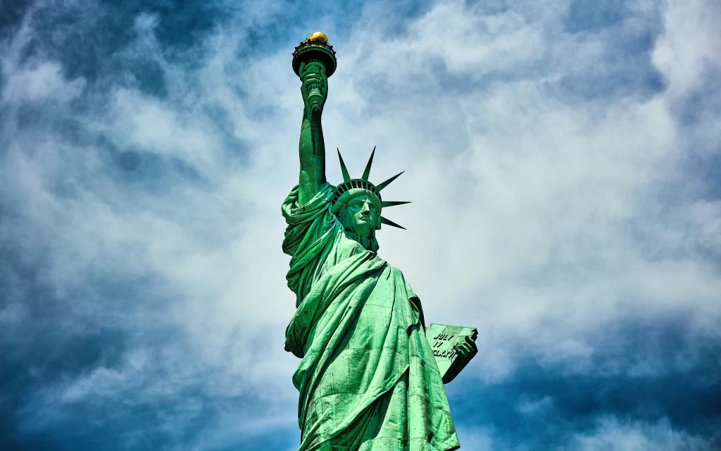 Statue Liberty Torch Crown Blue Sky Clouds Green