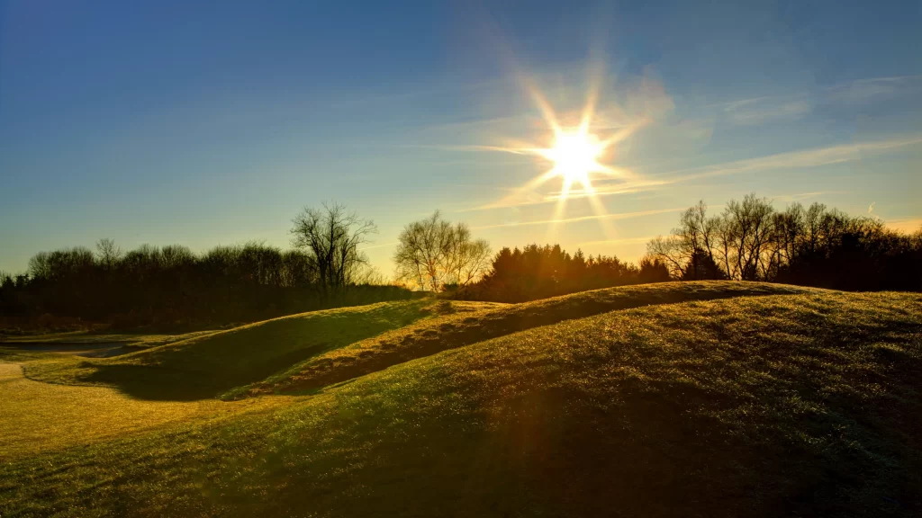 Sunlight landscape grass trees sky hills