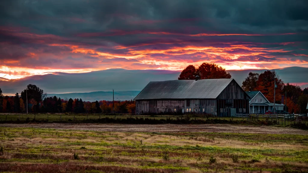 Sunset barn rural landscape clouds tranquility