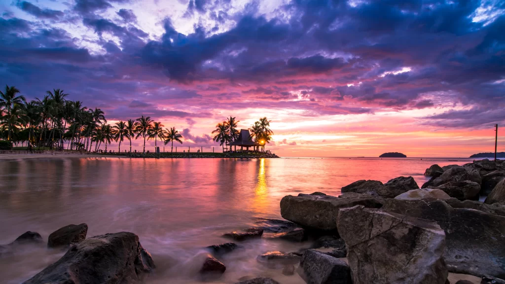 Sunset Beach Rocks Palm Trees Sky Clouds