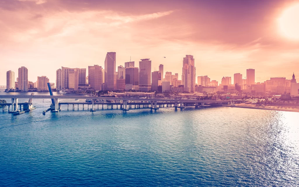 Sunset cityscape skyline bridge water buildings