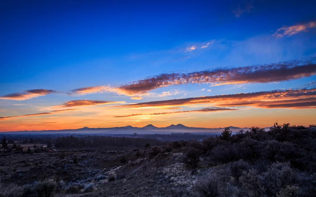 Sunset landscape mountains sky clouds twilight