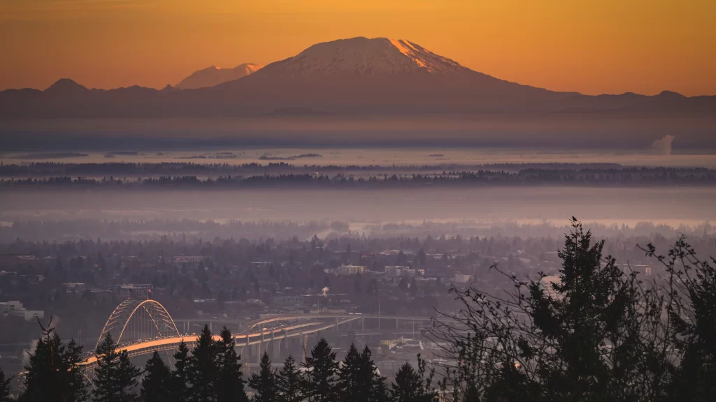 Sunset mountain bridge cityscape fog