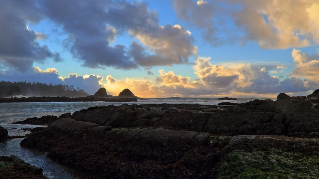 Sunset ocean rocks clouds landscape nature