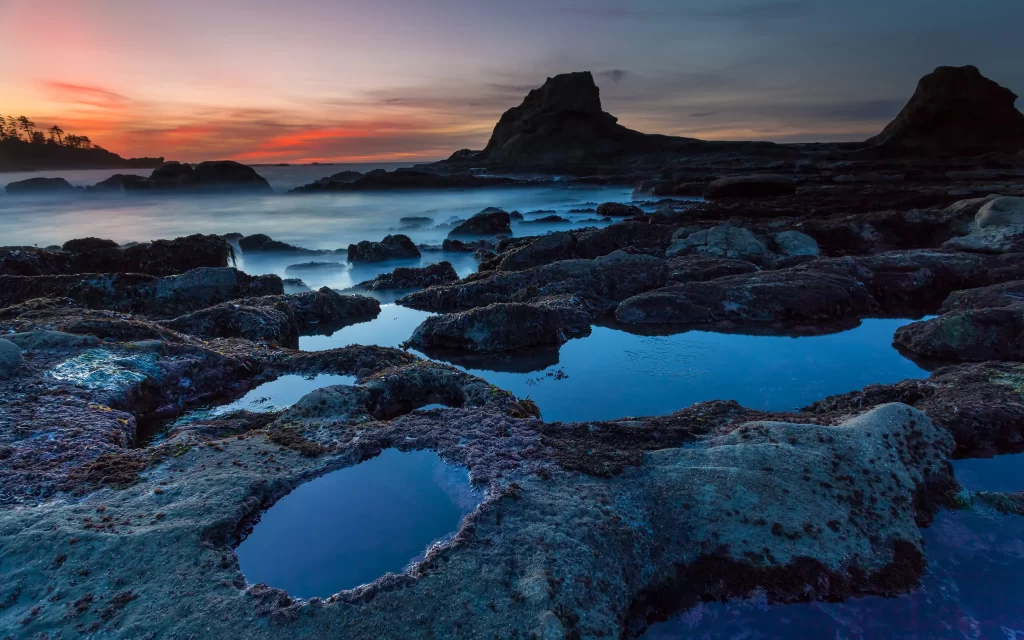 Sunset ocean rocks tide pools sky landscape