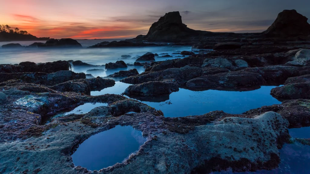 Sunset ocean rocks tide pools sky landscape