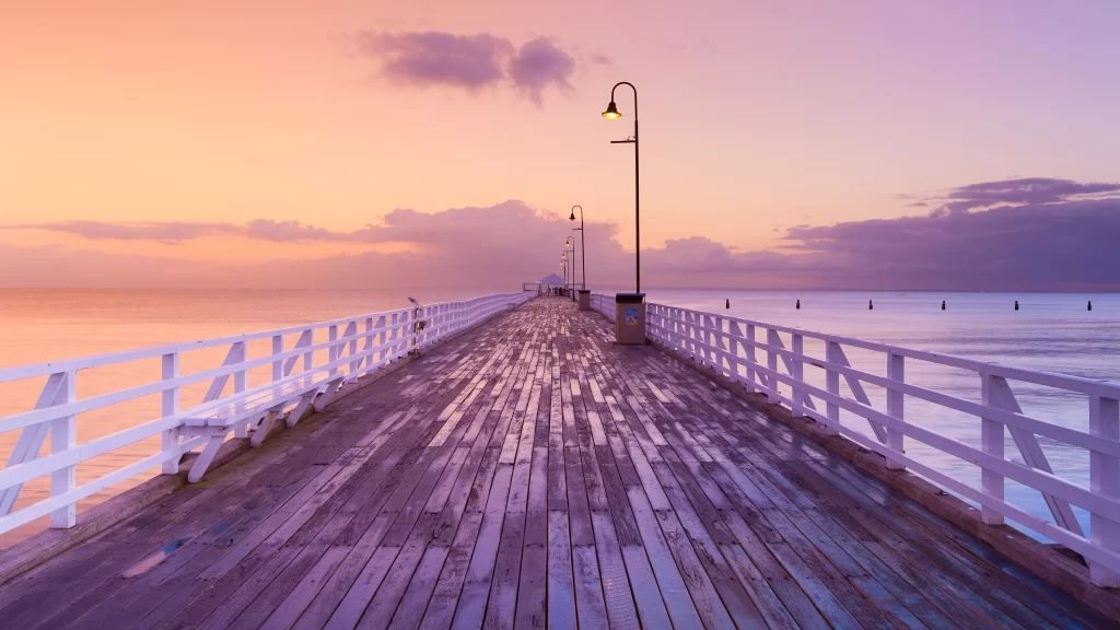Sunset pier ocean sky clouds lamp