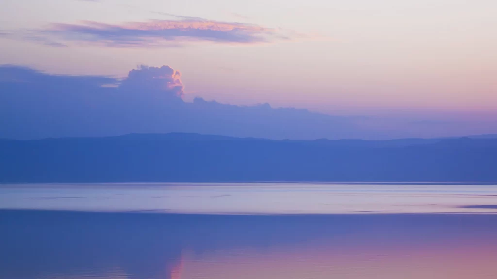 Sunset sky clouds water reflection colors