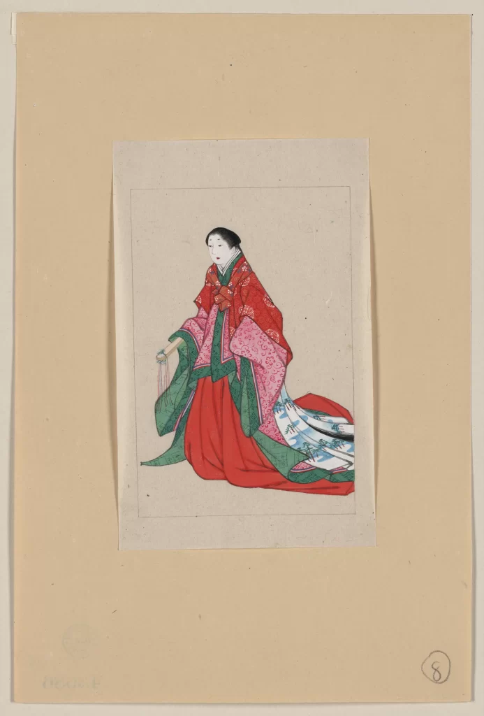 Traditional Attire Elegant Red And Green Detailed Patterns Poised Figure