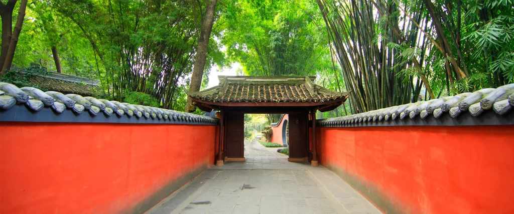 Traditional Architecture Red Walls Bamboo Forest Pathway Gate Greenery