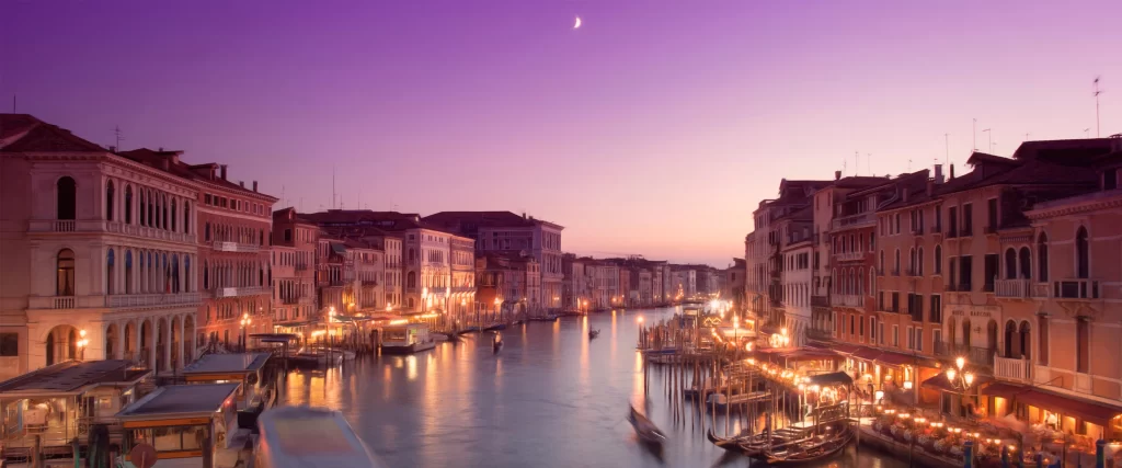 Venice canal twilight buildings lights moon
