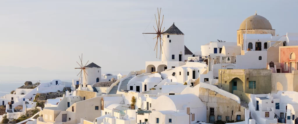 White Buildings Blue Sky Sea Windmills Domes Stairs