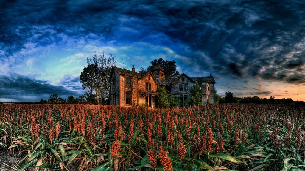 abandoned house field sunset clouds eerie rural