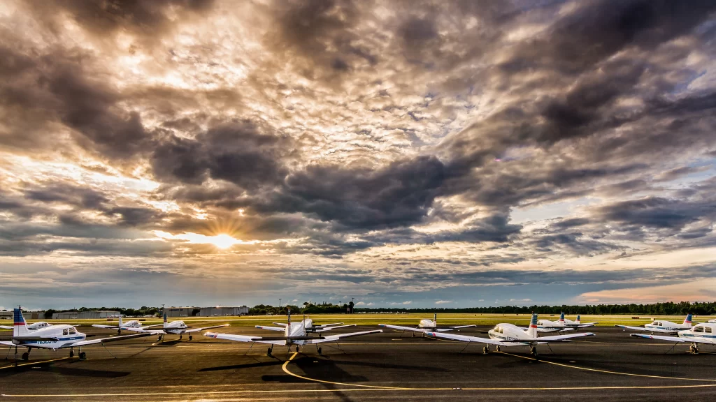 airplanes sunset clouds runway landscape aviation