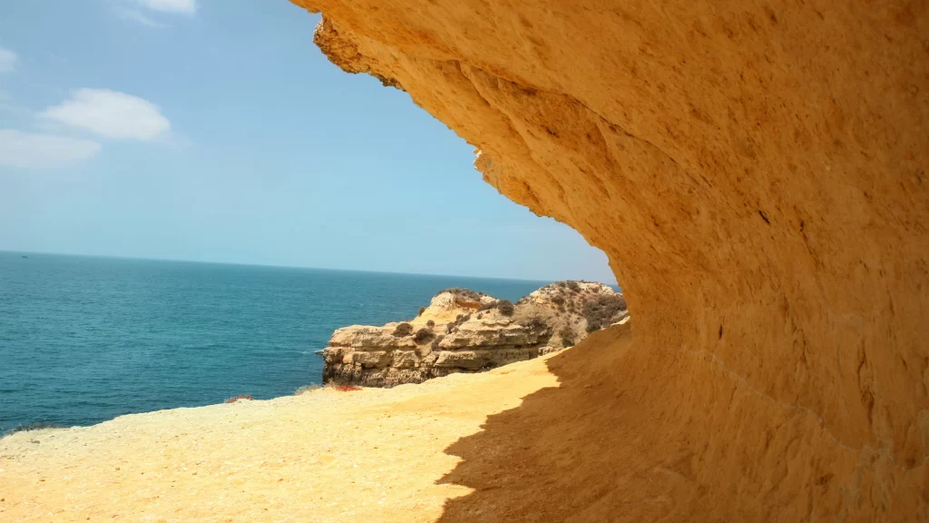 Beach Ocean Rock Cliff Blue Sky Clouds