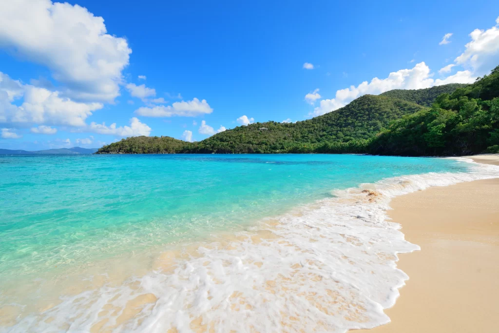 beach ocean waves sand sky clouds