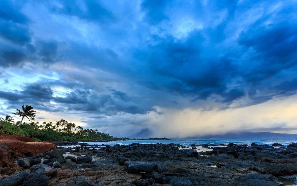 beach storm clouds ocean rain rocks