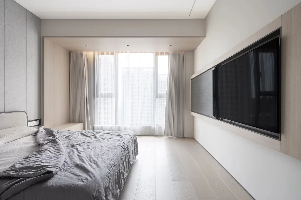 Bedroom Neutral Tones Minimalist Bed Wall-mounted Tv Natural Light