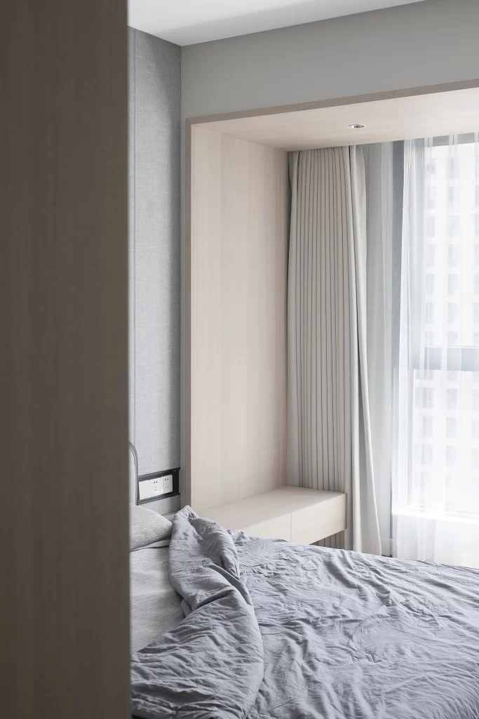 Bedroom Neutral Tones Simple Bed Built-in Storage Soft Curtains Natural Light