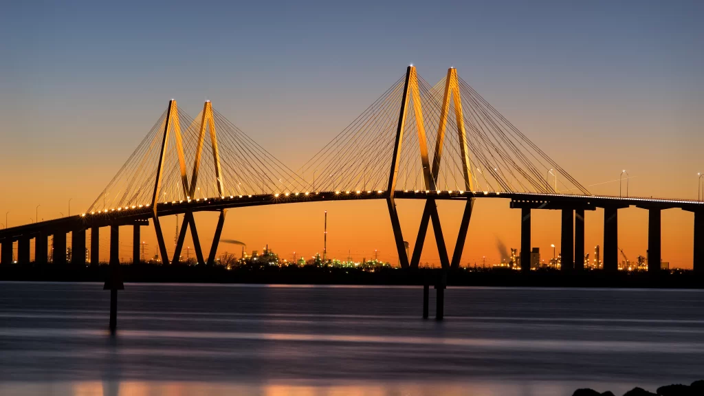 bridge sunset water cityscape lights twilight