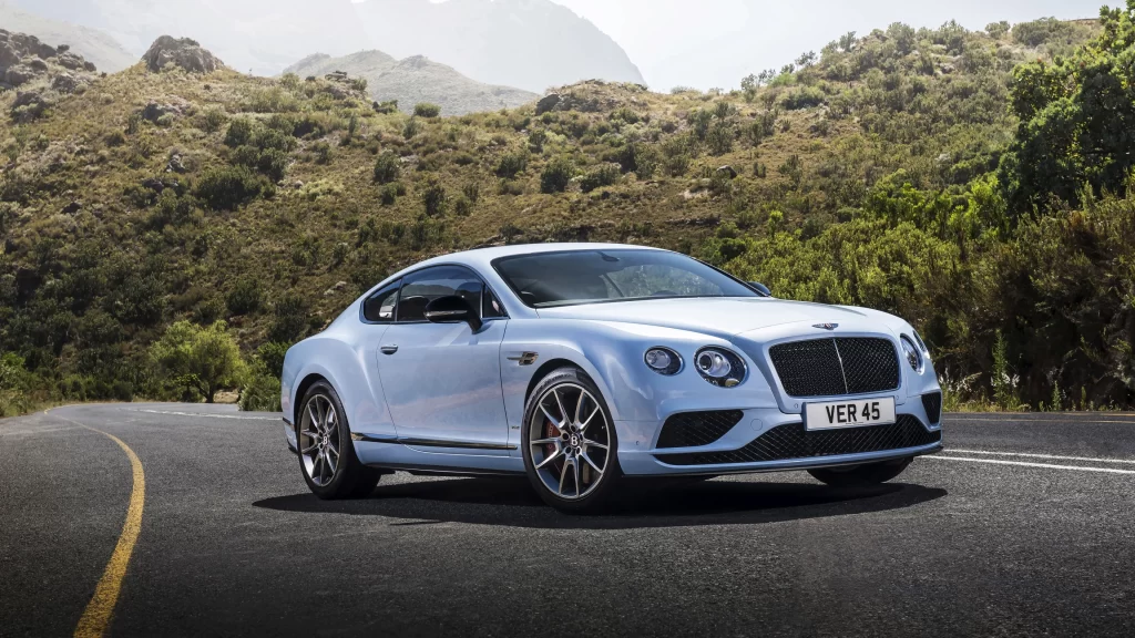 car luxury road mountain green
